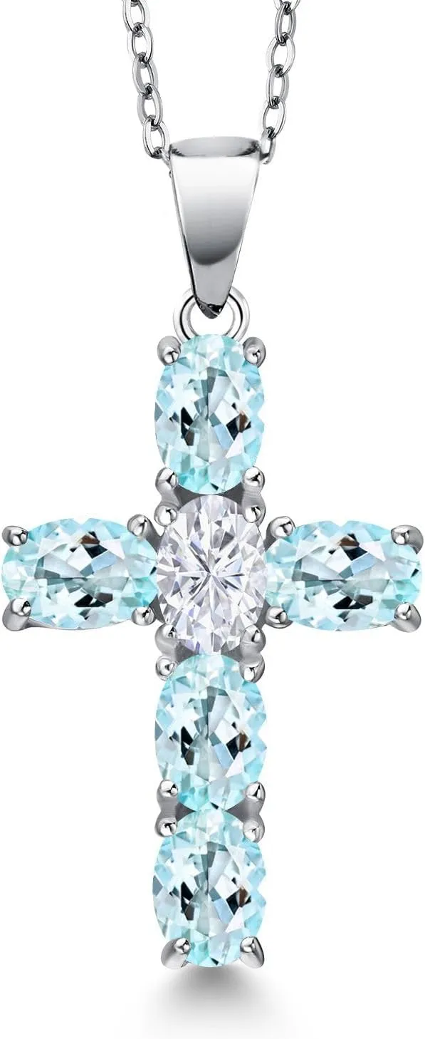 Gem Stone King 925 Sterling Silver Sky Blue Topaz and White Moissanite Cross Pendant Necklace for Women | 3.00 Cttw | Gemstone November Birthstone | Oval 6X4MM | With 18 Inch Chain
