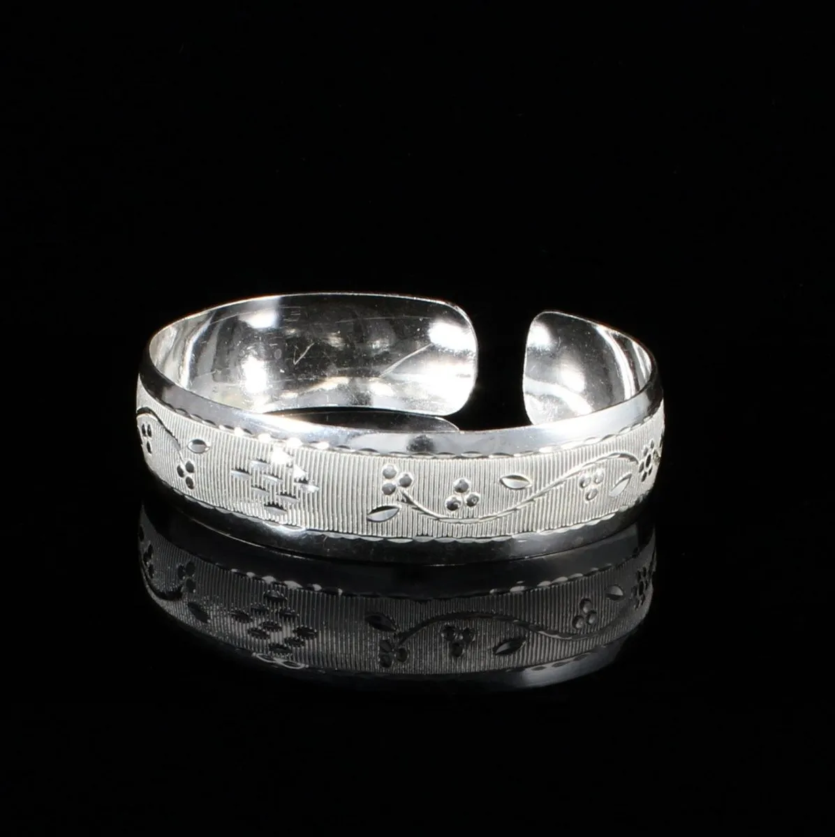 Wrist Band with Grape Vine Pattern