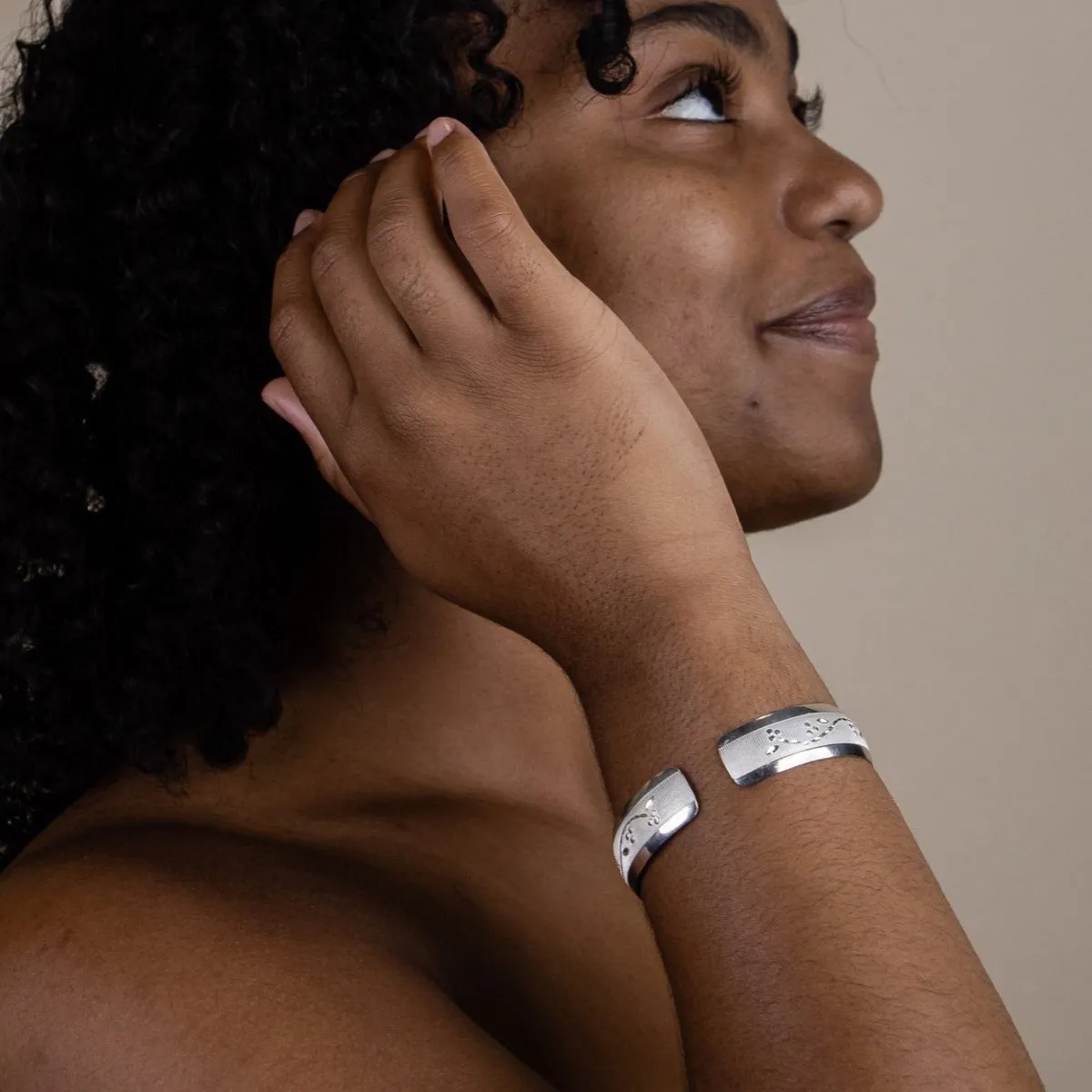 Wrist Band with Grape Vine Pattern