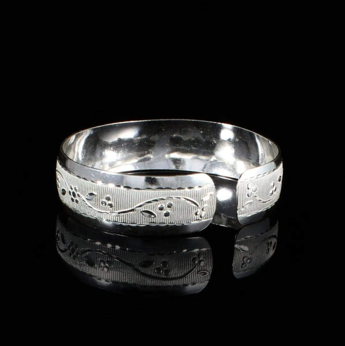 Wrist Band with Grape Vine Pattern
