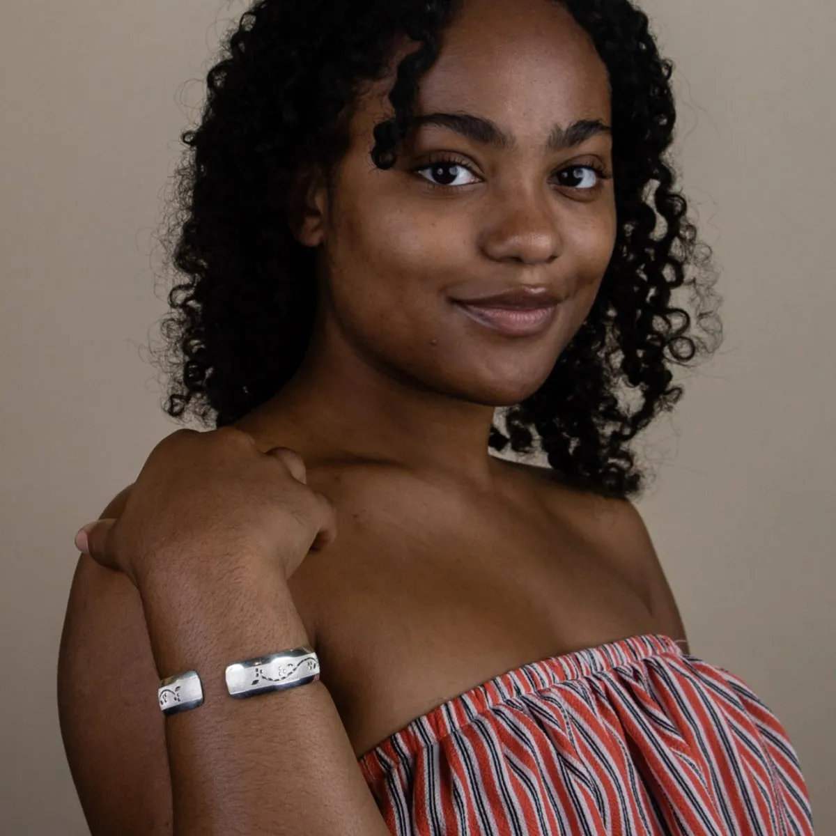 Wrist Band with Grape Vine Pattern