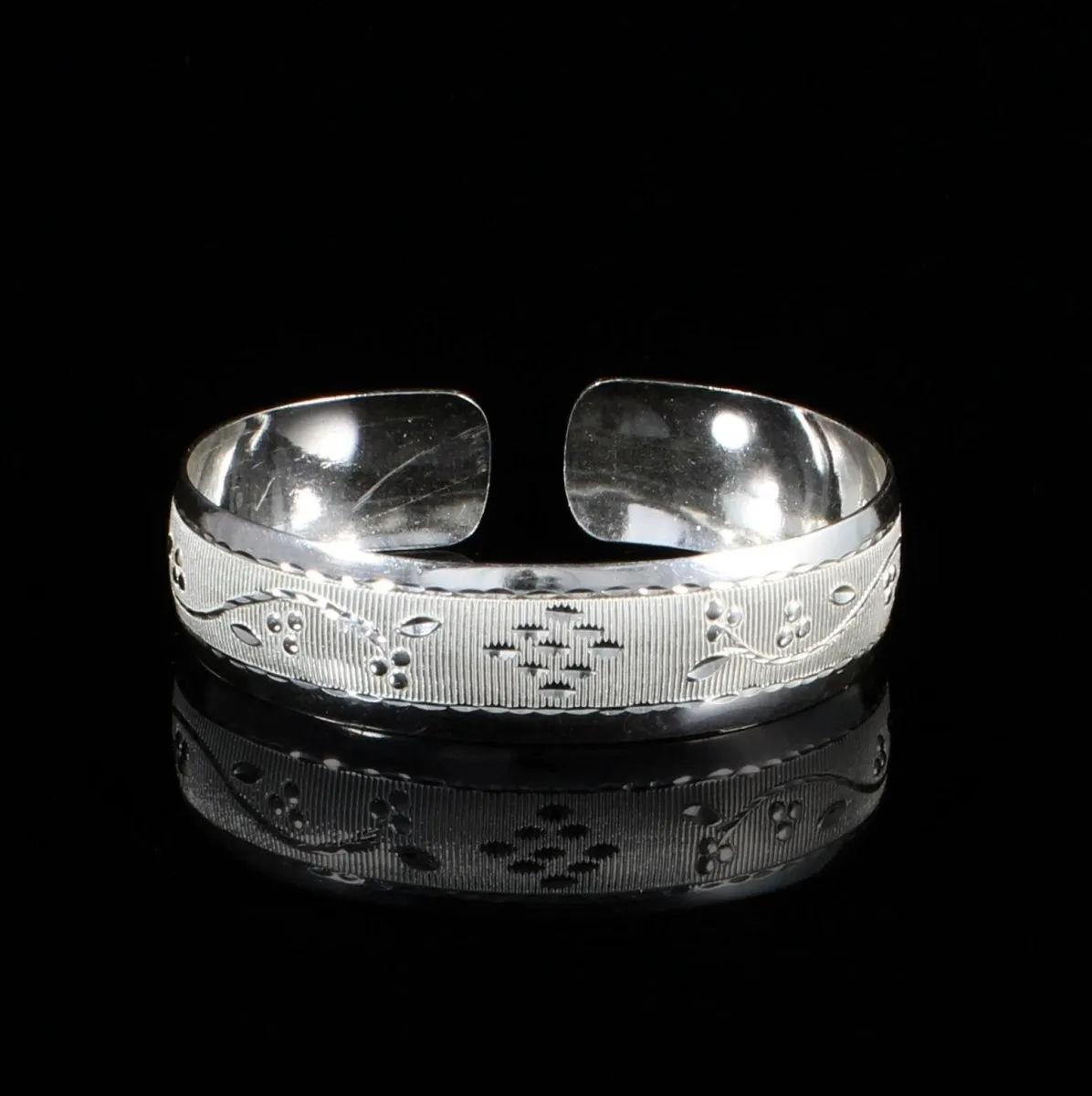 Wrist Band with Grape Vine Pattern